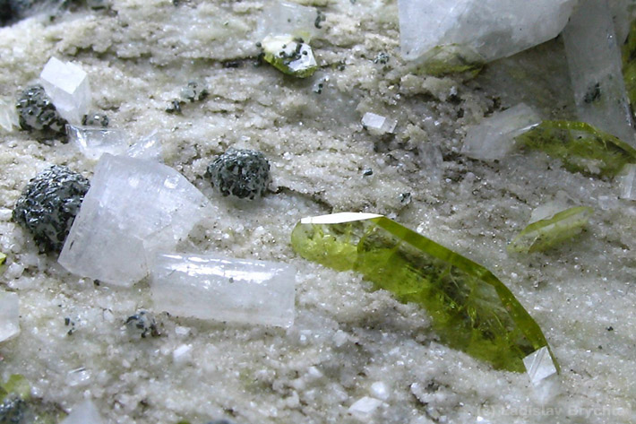 Bright green gemmy titanite crystals with albite from Shigar Valley, Pakistan