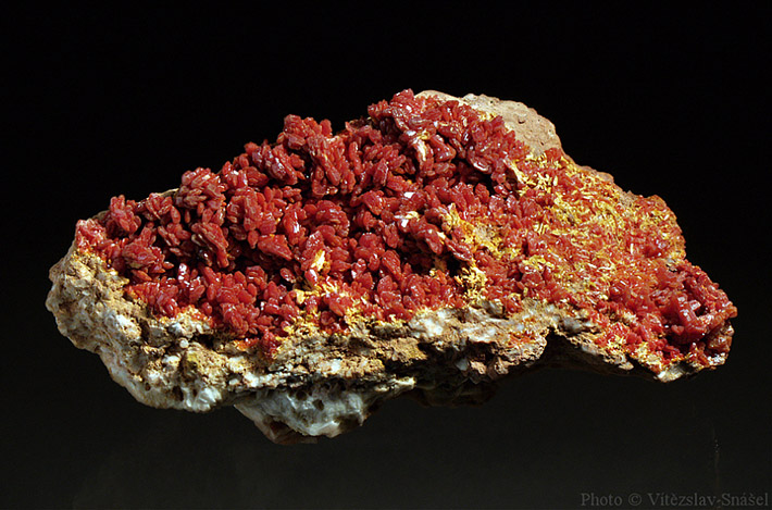 Cluster of deep red vanadinite crystals from Mibladen, Morocco