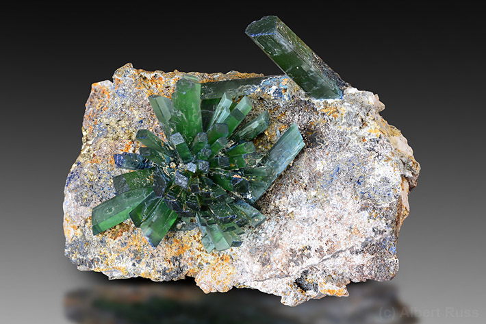 Spray of elongated green vivianite crystals from Oruro department, Bolivia