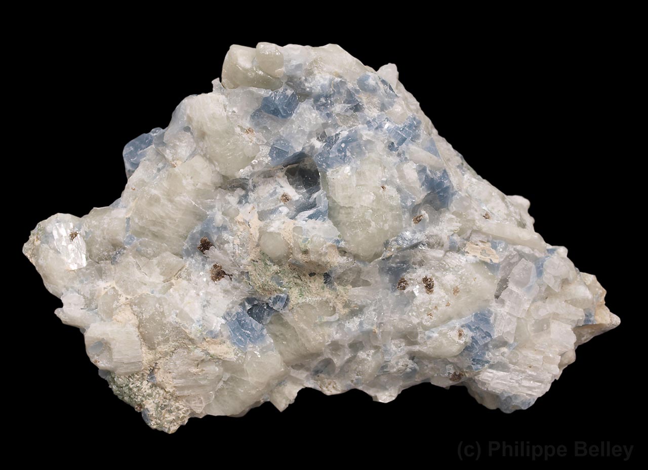 Pale wollastonite crystals from Highway-50 road cut near Wakefield, Québec, Canada