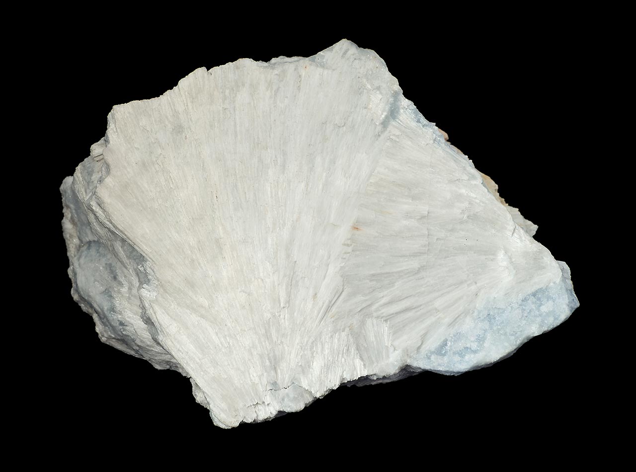 Acicular white wollastonite mineral on the bluish marble from Nezdice, Czech Republic