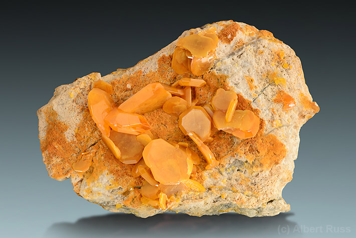 Tabular yellow wulfenite crystals on limestone matrix from Bleiberg, Austria
