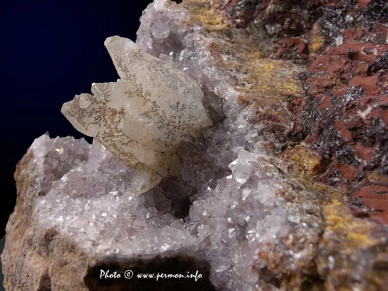 Mineral photo of Calcite, Quartz (var. amethyst) from locality Doubravice, Czech Republic