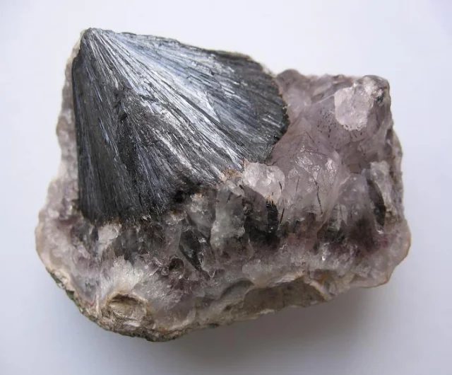 Mineral photo of Goethite, Quartz (var. amethyst) from locality Kozákov, Czech Republic
