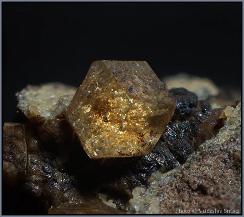 Mineral photo of Paulingite-(Ca) from locality Vinařice, Czech Republic