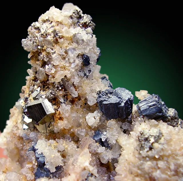 Mineral photo of Bournonite, Pyrite from locality Cavnic, Romania
