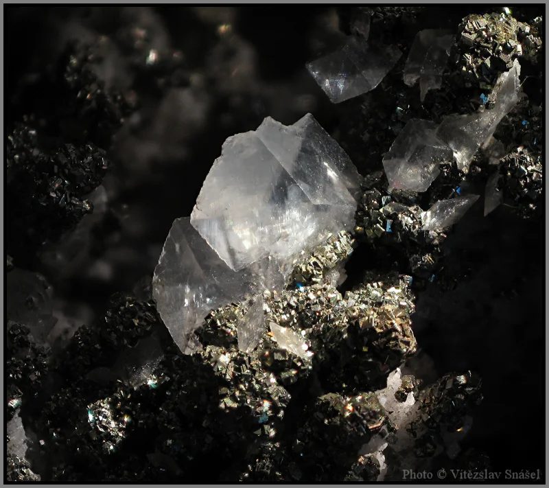 Mineral photo of Calcite, Pyrite from locality Příbram, Czech Republic