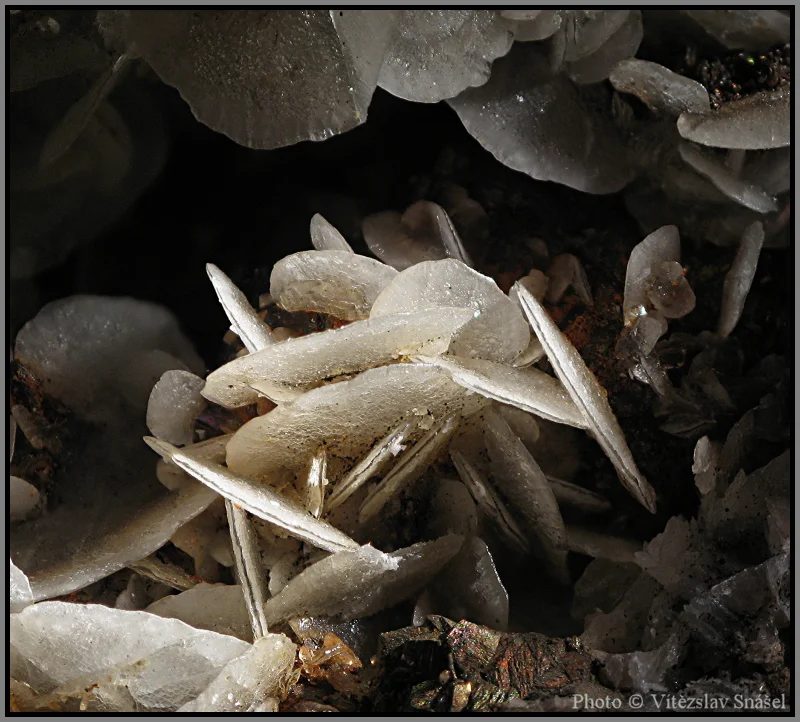 Mineral photo of Calcite, Pyrite from locality Jáchymov, Czech Republic
