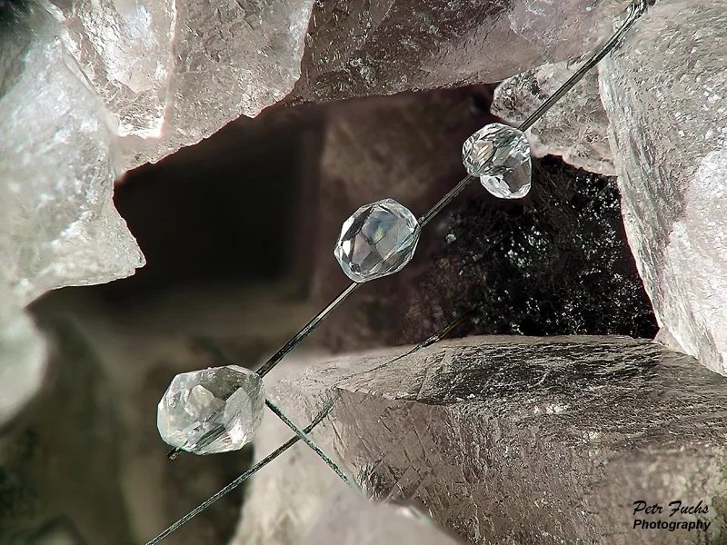Mineral photo of Bismuthinite, Fluorite from locality Krupka, Czech Republic