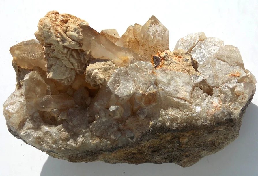 Mineral photo of Albite, Quartz (var. rock crystal) from locality Krupka, Czech Republic