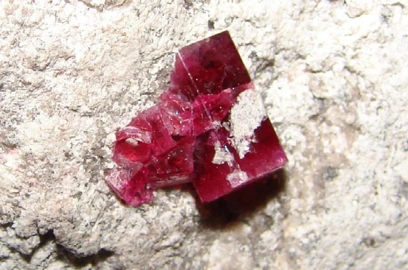 Mineral photo of Beryl (var. bixbite) from locality Violet claim, United States of America