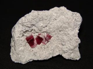 Mineral photo of Beryl (var. bixbite) from locality Violet claim, United States of America