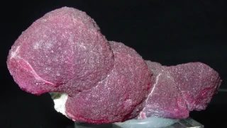 Mineral photo of Elbaite (var. rubellite) from locality Momeik, Myanmar