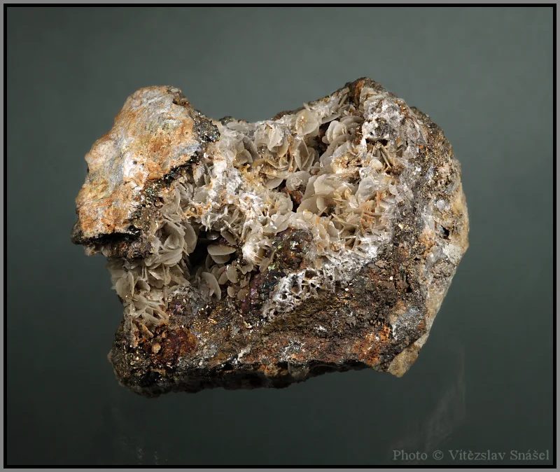 Mineral photo of Calcite, Pyrite from locality Jáchymov, Czech Republic