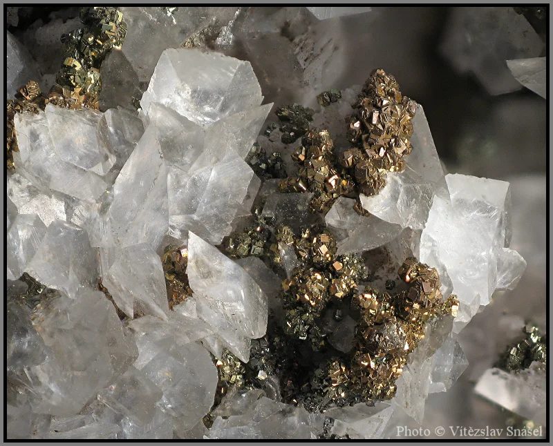 Mineral photo of Calcite, Pyrite from locality Příbram, Czech Republic