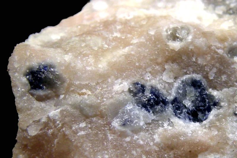 Mineral photo of Corundum (var. sapphire) from locality Krty, Czech Republic