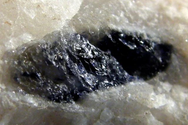 Mineral photo of Corundum (var. sapphire) from locality Krty, Czech Republic