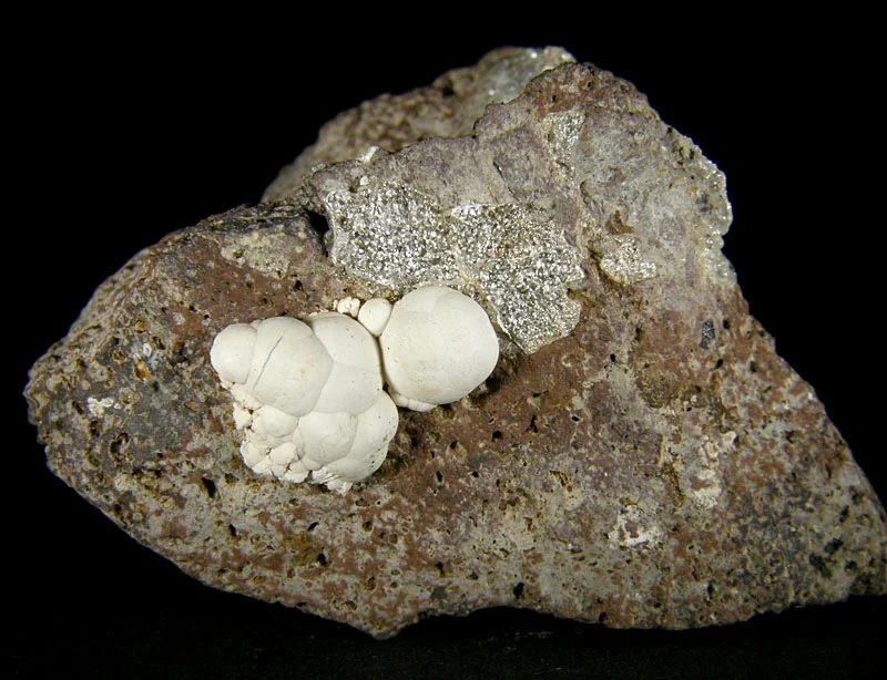 Fluorapatite, Opal (var. hyalite)