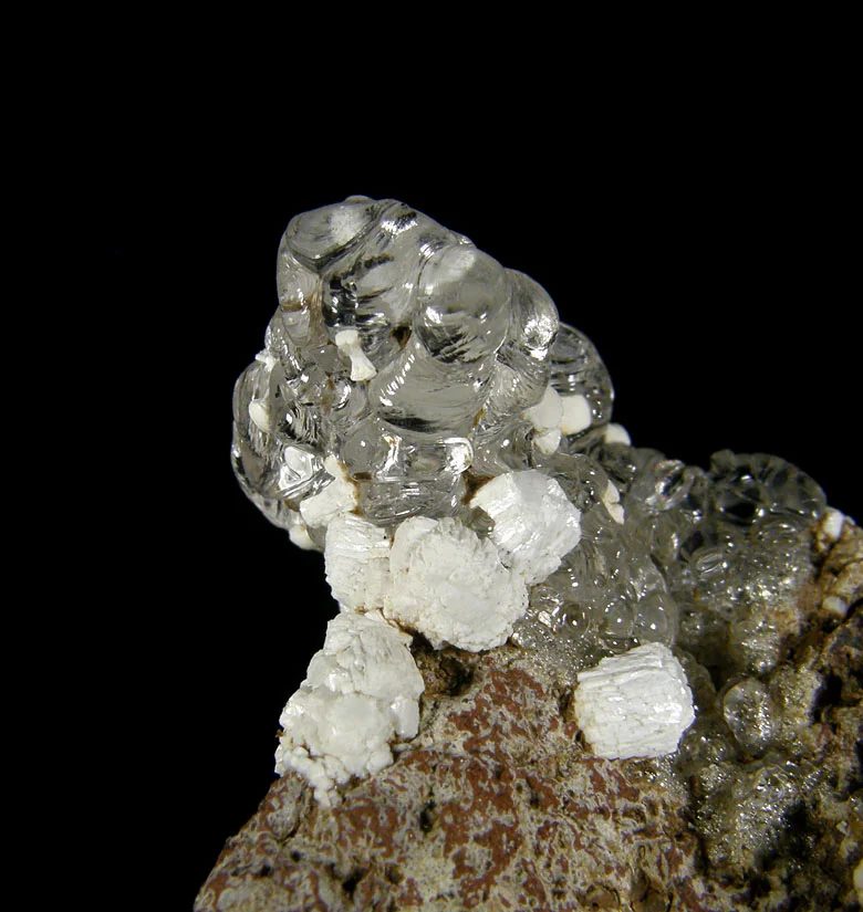 Mineral photo of Fluorapatite, Opal (var. hyalite) from locality Valeč, Czech Republic