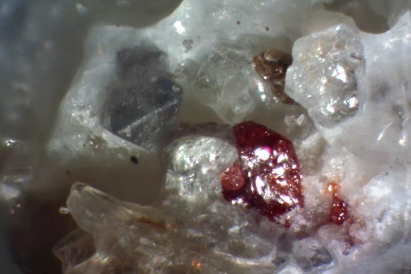 Mineral photo of Clinohumite, Spinel from locality Krty, Czech Republic