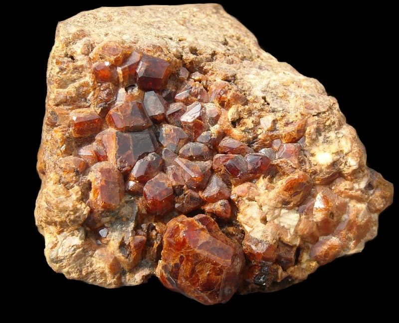 Mineral photo of Grossular (var. hessonite) from locality Žulová, Czech Republic