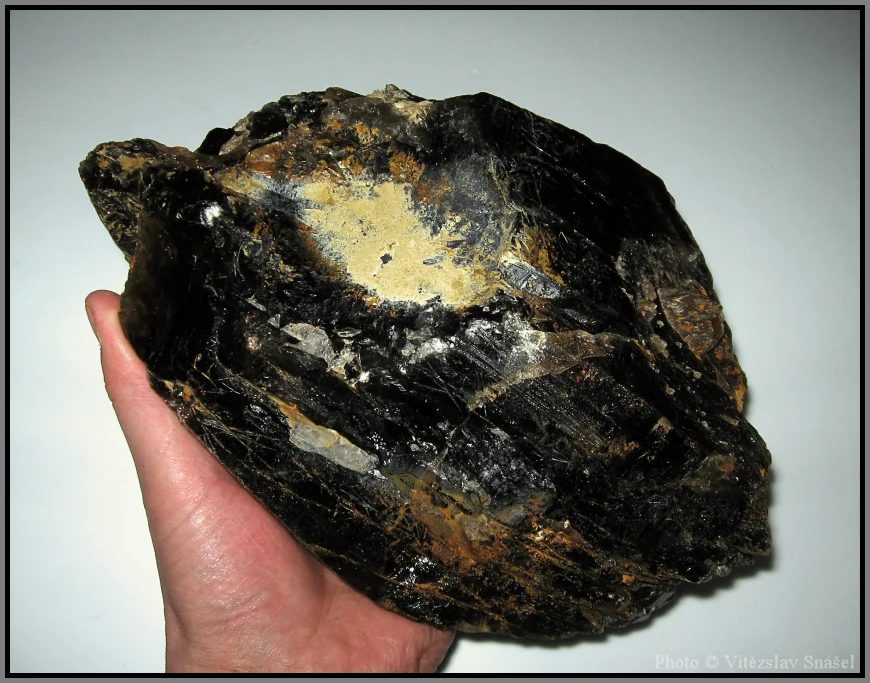 Mineral photo of Quartz (var. smoky), Schorl from locality Suky, Czech Republic
