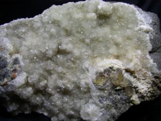 Mineral photo of Calcite, Tridymite from locality Vechec, Slovakia