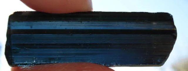 Mineral photo of Elbaite (var. indigolite) from locality Teofilo Otoni, Brazil