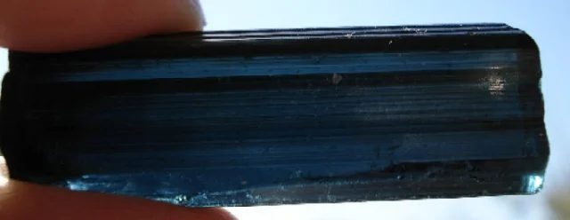 Mineral photo of Elbaite (var. indigolite) from locality Teofilo Otoni, Brazil