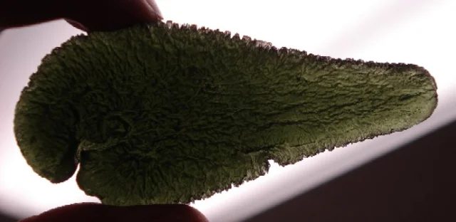 Mineral photo of Moldavite from locality Slavče, Czech Republic