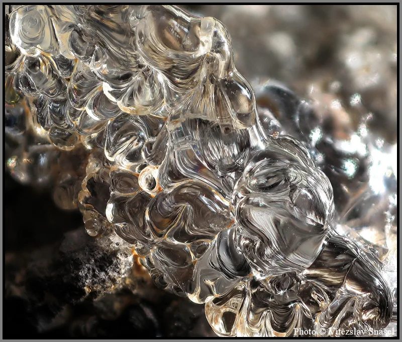 Mineral photo of Opal (var. hyalite) from locality Valeč, Czech Republic