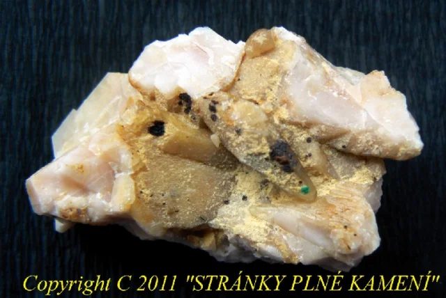 Mineral photo of Baryte, Calcite, Limonite, Malachite from locality Předklášteří, Dřínová, Czech Republic