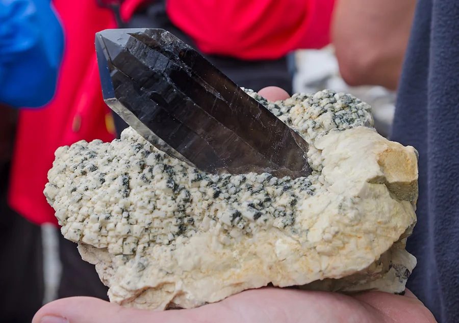 Mineral photo of Albite, Quartz (var. smoky) from locality Strzegom, Poland