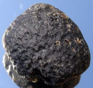Mineral photo of Moldavite from locality Mohelno, Czech Republic