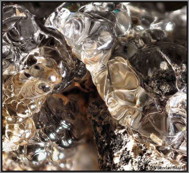 Mineral photo of Opal (var. hyalite) from locality Valeč, Czech Republic