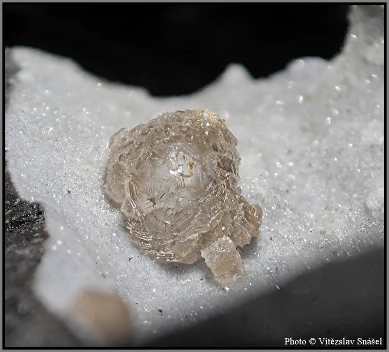 Thomsonite-(Ca)