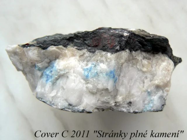 Mineral photo of Beryl, Hematite from locality Skály u Rýmařova, Czech Republic