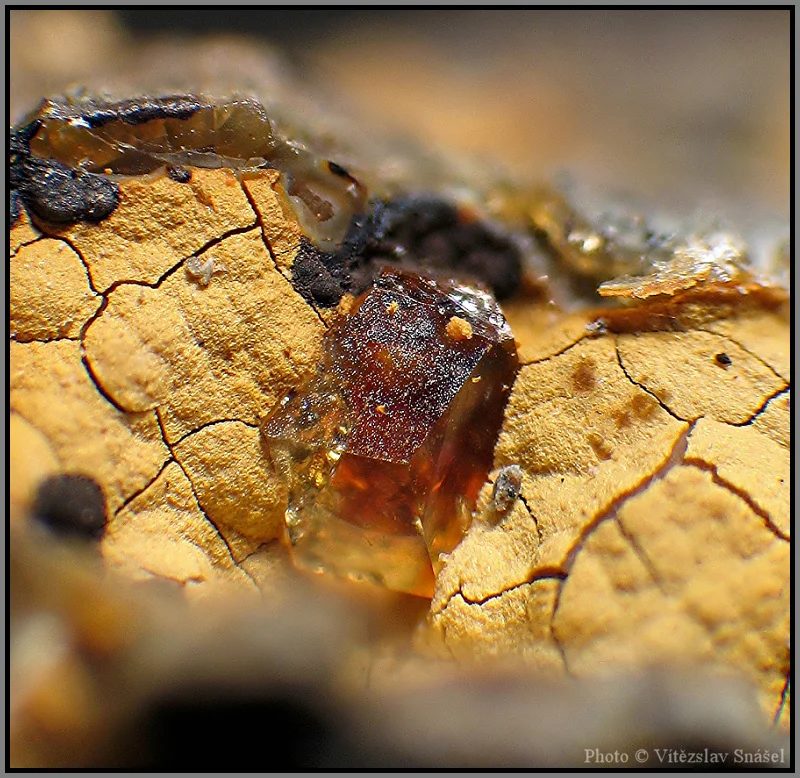 Mineral photo of Paulingite-(Ca) from locality Vinařice, Czech Republic