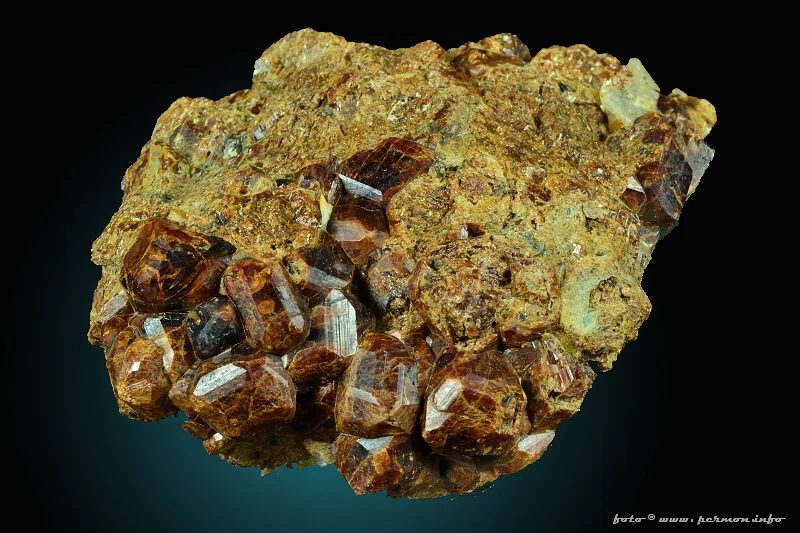 Mineral photo of Grossular (var. hessonite) from locality Žulová, Czech Republic
