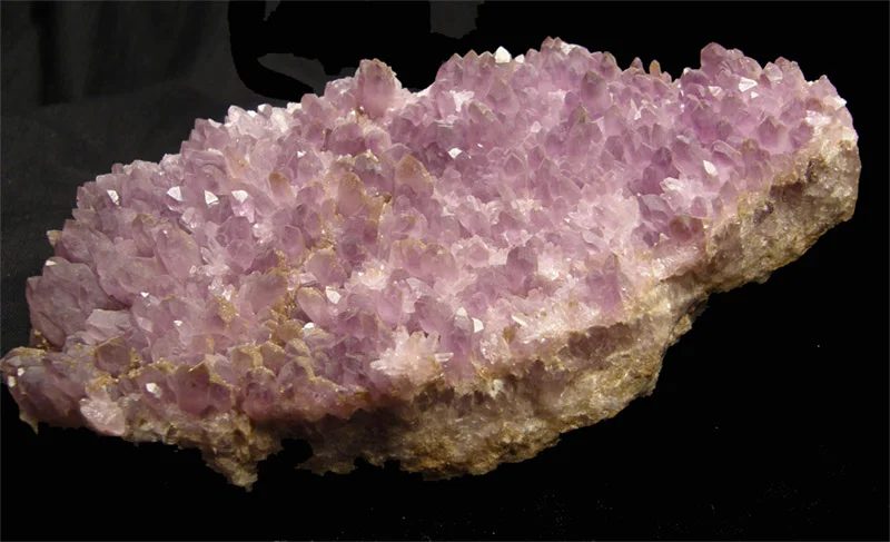 Mineral photo of Pyrite, Quartz (var. amethyst) from locality Banská Štiavnica, Slovakia