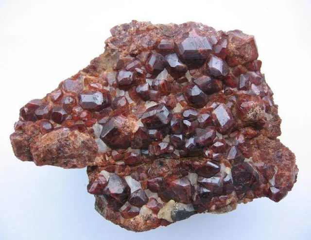 Mineral photo of Grossular (var. hessonite) from locality Žulová, Czech Republic