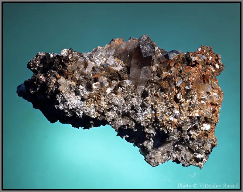 Mineral photo of Quartz (var. smoky), Zinnwaldite from locality Cínovec, Czech Republic