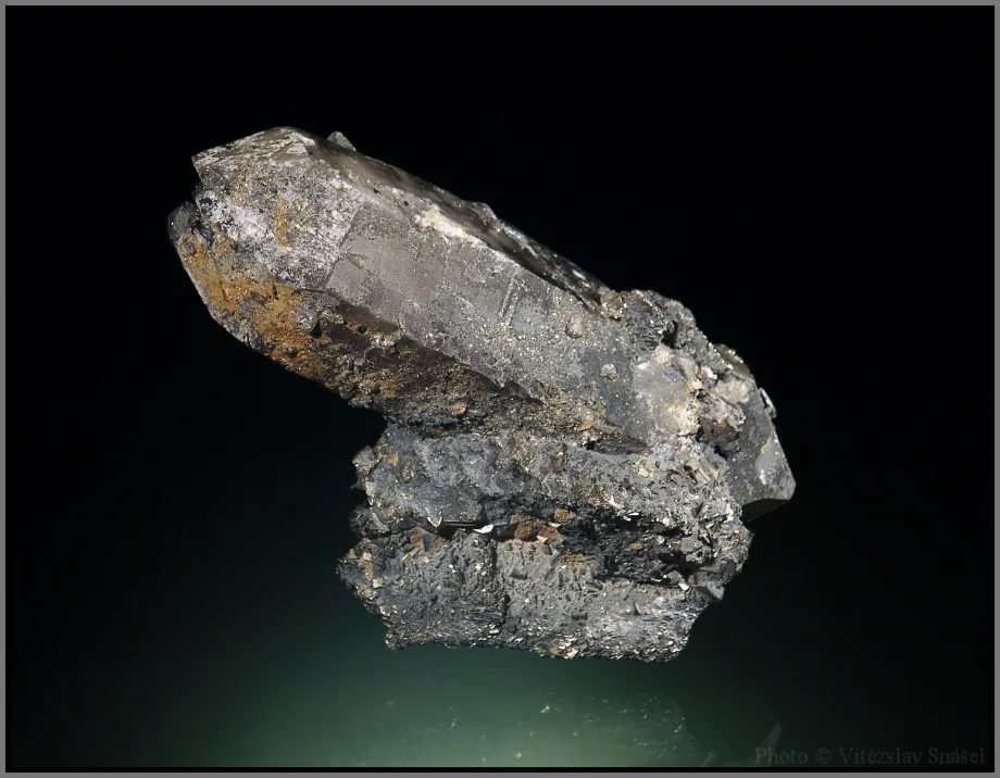 Mineral photo of Pyrite, Quartz (var. smoky) from locality Dalnegorsk, Russia