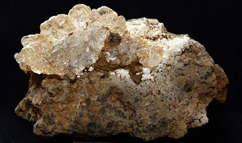 Mineral photo of Opal (var. hyalite) from locality Valeč, Czech Republic