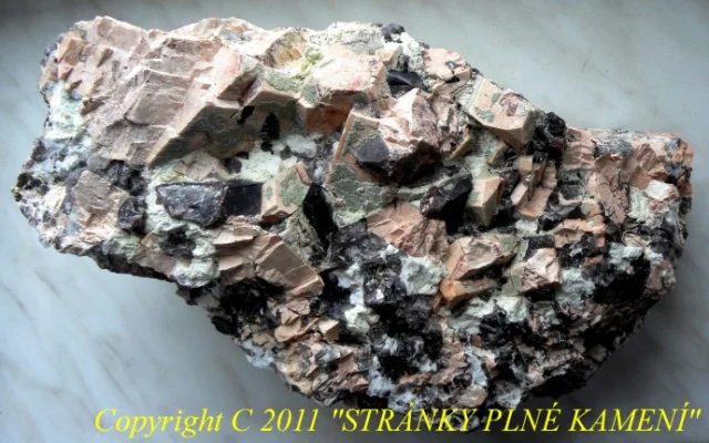 Mineral photo of Orthoclase, Quartz (var. smoky) from locality Liberec - Ruprechtice, Czech Republic