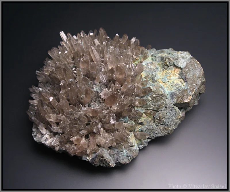 Mineral photo of Pyrite, Quartz (var. smoky) from locality Cavnic, Romania