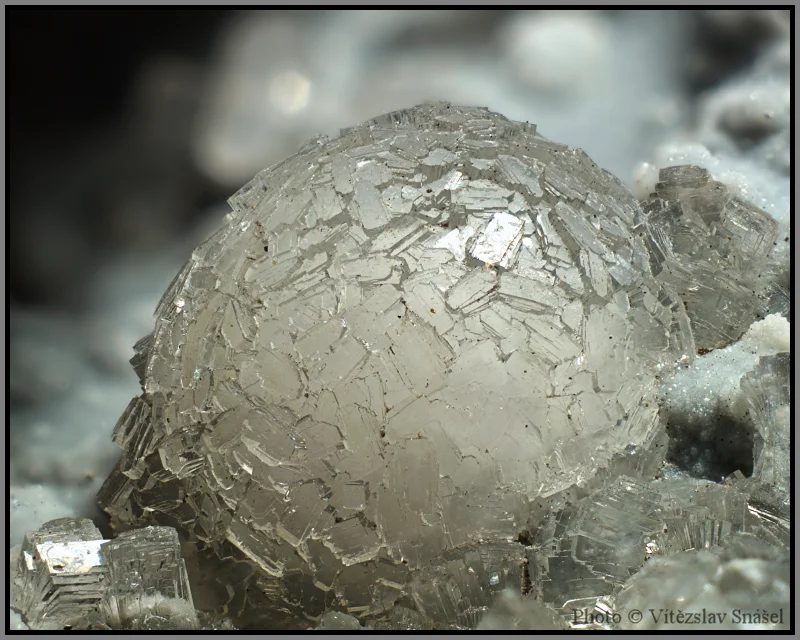 Thomsonite-(Ca)