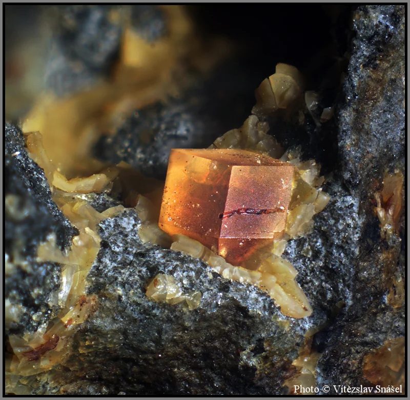 Mineral photo of Paulingite-(Ca) from locality Vinařice, Czech Republic