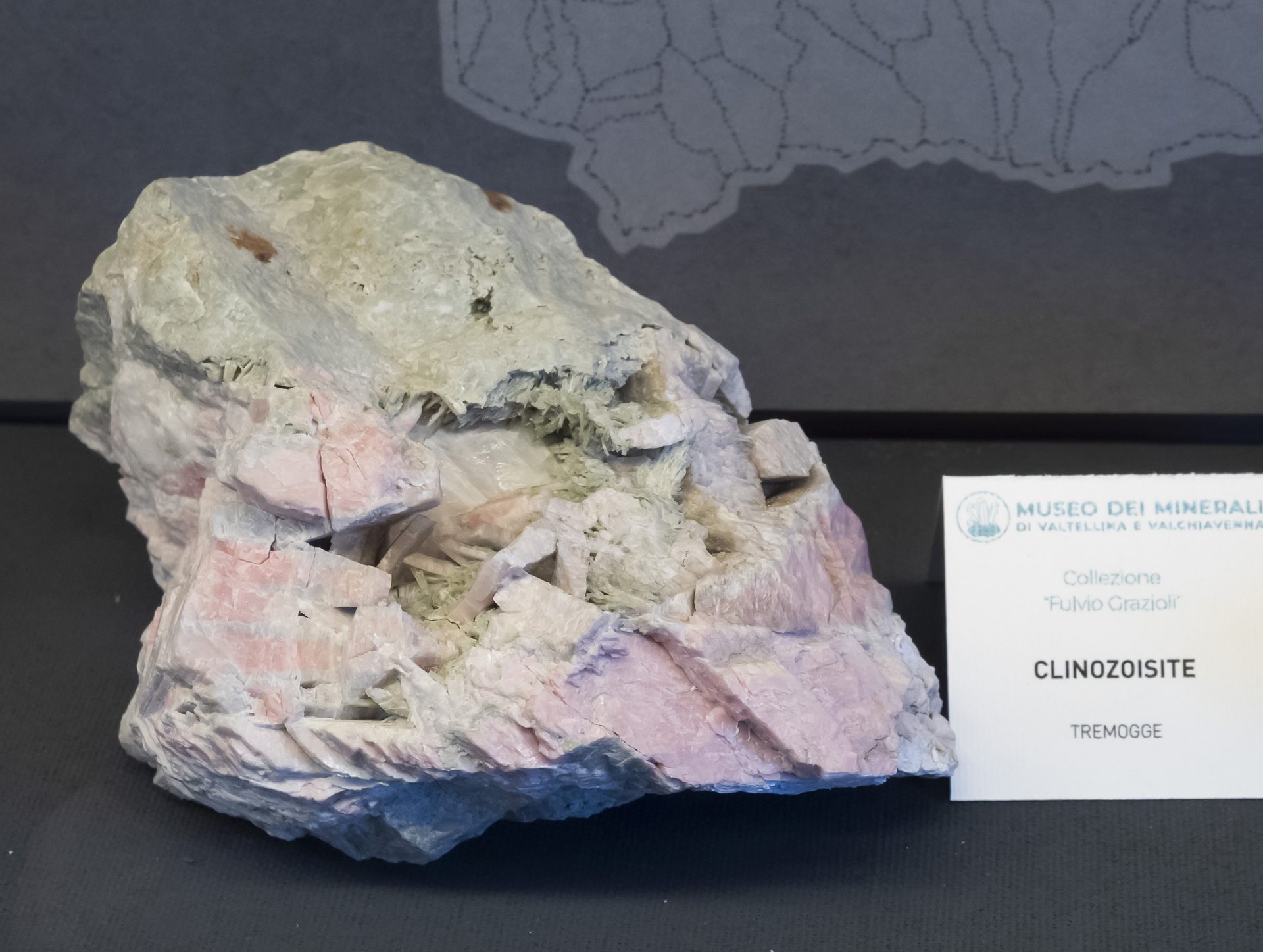 Mineral photo of Clinozoisite (var. Clinothulite) from locality Pizzo delle Tre Mogge, Sondrio Province, Lombardy, Italy