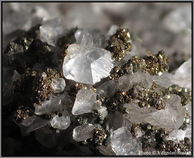 Mineral photo of Calcite, Pyrite from locality Příbram, Czech Republic